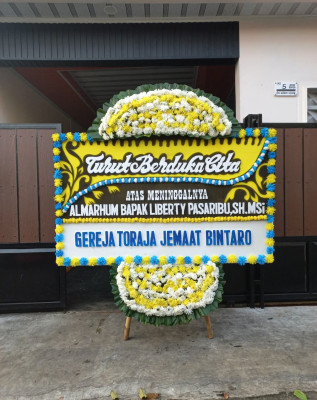 Papan Bunga Duka di Namorambe
